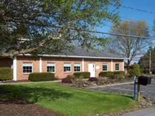 hand doctor near syracuse ny hand therapy office in camillus building exterior and parking lot