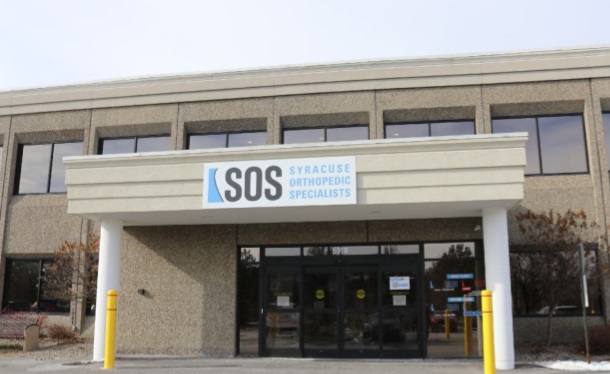 knee doctors near syracuse ny knee specialist office with syracuse orthopedic specialists sos sign above door